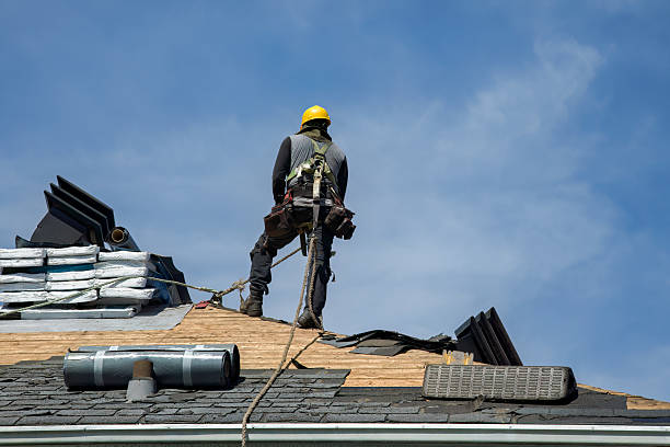 Professional Gutter Installation technician working in Robertsville, NJ